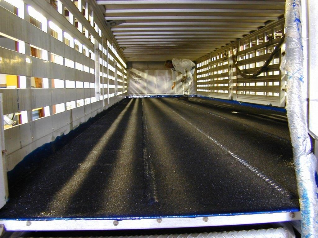 Towable RV roof recoated with polyurea